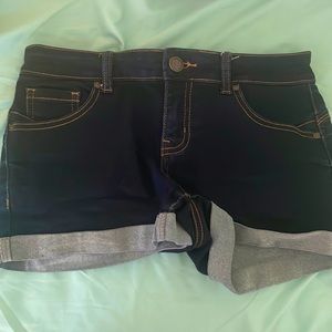 these are low rise dark blue jean shorts